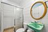 Shared bathroom in utility room - great for rinsing off after a beach day!