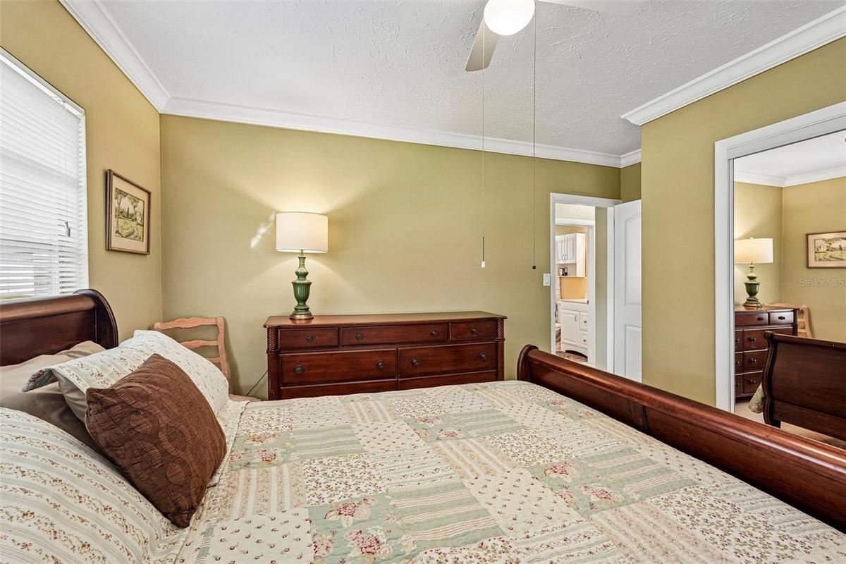 309 primary bedroom, with mirrored closet