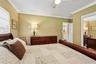 309 primary bedroom, with mirrored closet