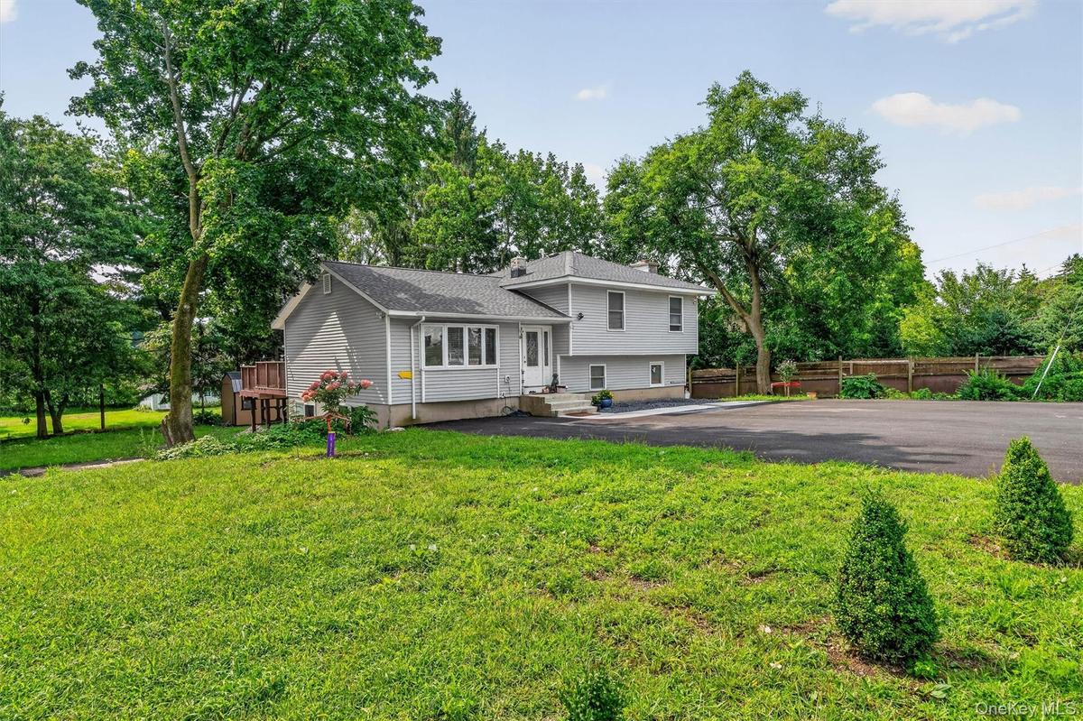 Large driveway accommodates several cars and offers a great space for play.