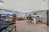 Open floor plan.  Hardwood under carpet.  Carpet not glued down.