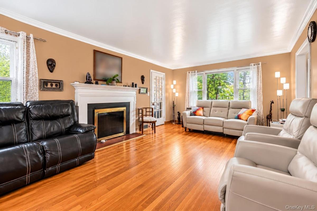 Living room with wood burning fireplace