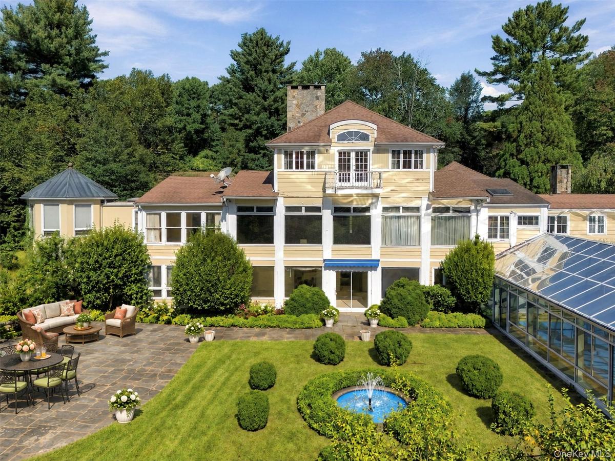 Complete with a Large Terrace and an Indoor/Outdoor Heated Conservatory Pool (Virtually Enhanced)