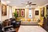Living area featuring recessed lighting, a modern ceiling fan, built-in recessed shelving, crown molding, and wood-finish flooring