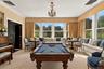 Former Music Room. With wrap around window seating.(Virtually Staged)