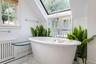 Soaking Tub and Skylight.