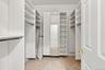 Home is filled with walkin closets, Halls of Closets & a corridor of Pantry Space.