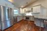 White and Bright! Stainless Appliances and Granite Countertops. New Refrigerator.
