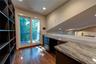 2nd Level Loft Office Built-In Custom Shelving and Granite Countered Desk