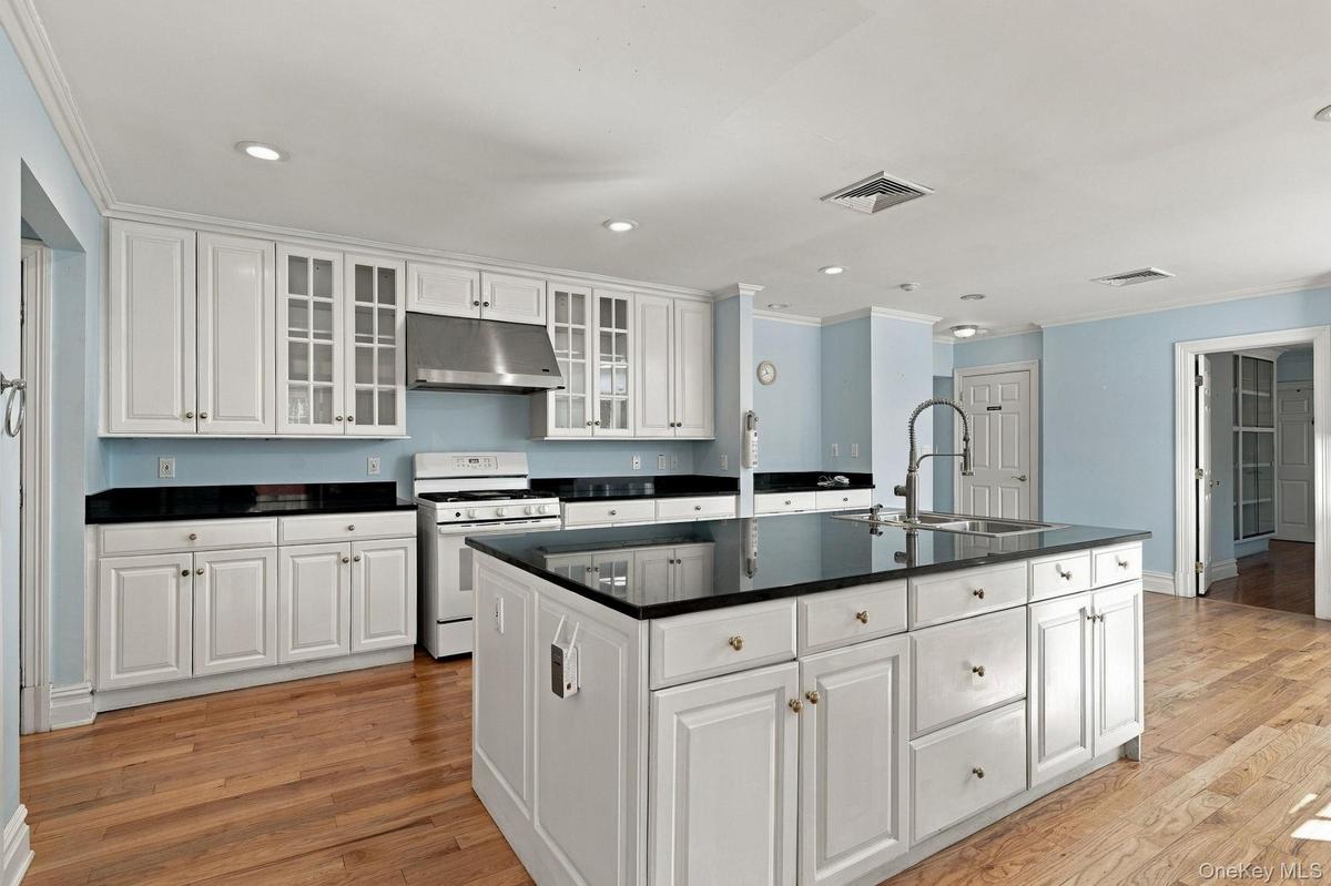 With dining area at the end and two sink stations
