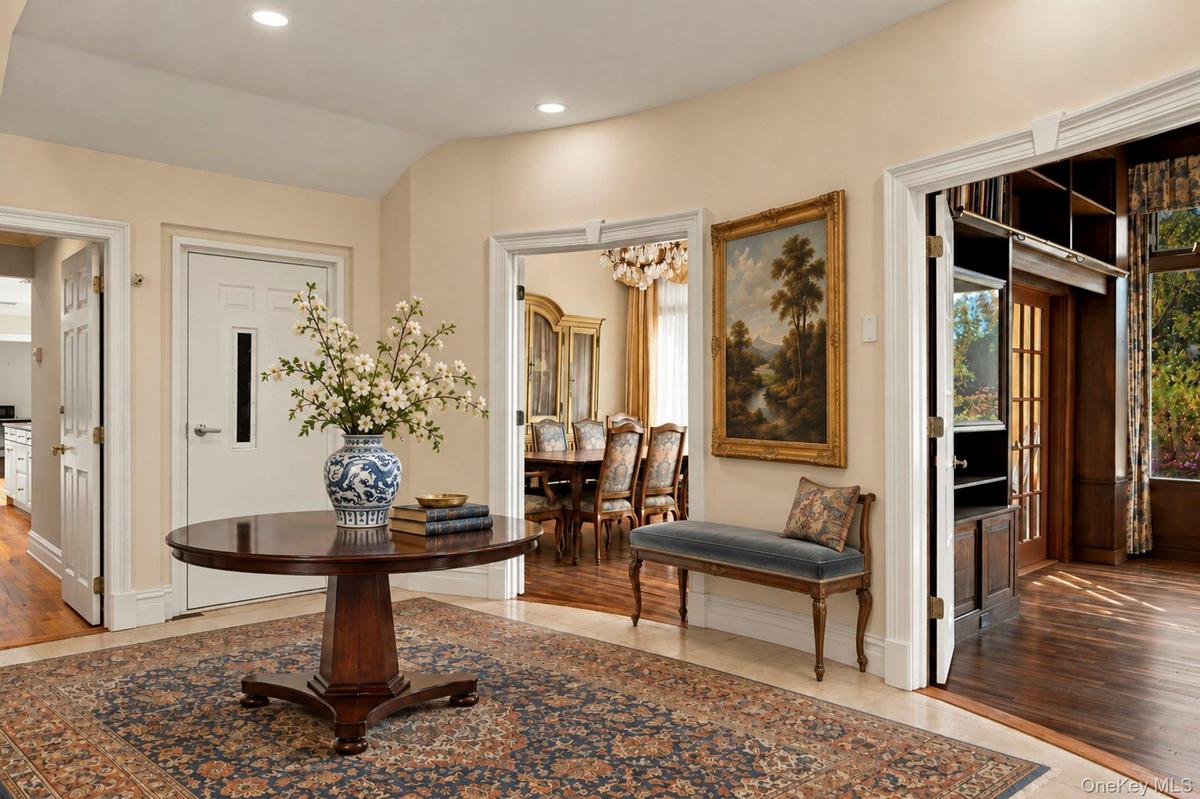 The Gateway to the 3 floor Elevator, Kitchen, Dining Room & Library (Virtually Staged although that is how it was before!)