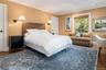 Second Level Primary Bedroom with recessed lighting, and hardwood floors.