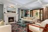 Formal Living Room Featuring coffered ceilings, recessed lighting and fireplace.