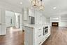 Kitchen with Open Floor Plan to Den