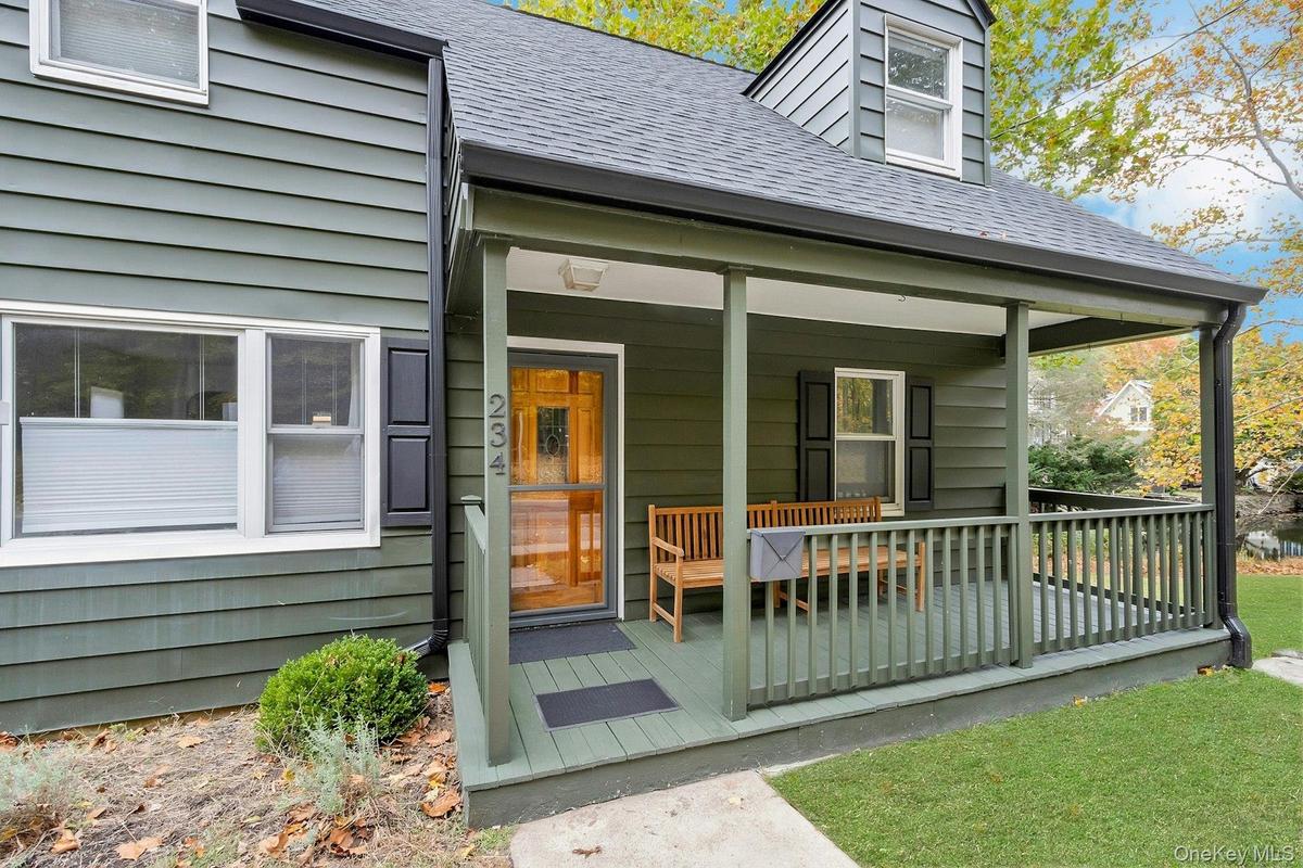 View of front of home featuring covered porch