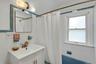 2nd floor full bathroom with vanity, bath tub