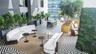 Outdoor terrace featuring a geometric tile floor, vertical living wall, and integrated built-in planters