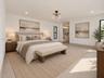 Vaulted ceilings, expansive floor-to-ceiling glass windows, recessed lighting, matte black linear fireplace, and modern multi-tiered brass chandelier