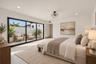 Floor-to-ceiling sliding glass doors with black frames, recessed ceiling lighting, a tiered drum-style chandelier, and light-toned tile flooring