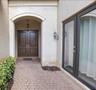 Grand arched entryway & separate office entrance