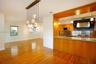 Dining room with views of kitchen and living room