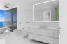 Modern floating vanity with a white countertop and rectangular sink, LED-backlit mirror, wall-mounted commode and bidet, and floor-to-ceiling glass-en