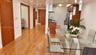 Interior featuring wood-finish flooring, recessed lighting, and kitchen cabinetry with integrated stainless steel appliances