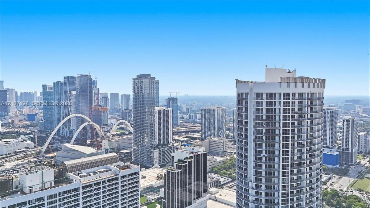 High-rise cityscape featuring urban skyline architecture, sweeping metropolitan horizons, and prominent modern skyscraper construction