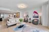 Experience refined coastal luxury in this beautifully appointed open-concept living space. Contemporary furnishings, elegant finishes, and a bright, a