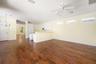 Open living in this family to kitchen light and bright spacious family room. Comes complete with custom shelves, wood floors and sliders that open ent