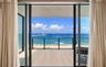 Floor-to-ceiling glass frames mesmerizing Atlantic Ocean views, creating an inspiring backdrop for a private den, executive office, or tranquil retrea
