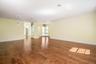 living room, dining room and front foyer with extra sq footage