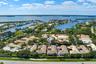 Nestled in the middle of this desired community between ocean and river