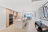 Experience seamless modern luxury with an open-concept design, exquisite kitchen finishes, and spectacular ocean views that enhance the residence’s so