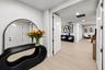A grand entrance showcasing contemporary elegance, refined finishes, and a beautifully appointed foyer that creates an unforgettable first impression