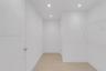 Storage area featuring recessed lighting, white walls, wood-finish flooring, and wire shelving