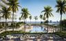 Outdoor terrace featuring a swimming pool, integrated cabanas, mature palm trees, stone-tile flooring, and glass railing balcony enclosures