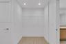 Closet featuring wood-finish flooring, integrated wire shelving, and recessed ceiling lighting