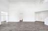 Vaulted ceilings, wood-finish flooring, double-door entryway, and recessed lighting