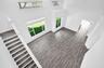 Vaulted ceilings featuring clerestory windows, wood-finish flooring, and expansive windows