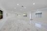 Entrance Door to living room area, dinning and open kitchen