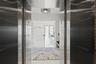 A private elevator escorts you to your 14th-floor residence overlooking the Atlantic Ocean.