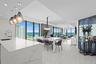 Spacious and luxurious with over 2500 sqft of air-conditioned living, 9 ft ceilings, wrap around balcony, 3 bedrooms, den/movie theatre, and 4 full ba