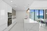 Culinary enthusiasts will enjoy a true chef's kitchen, highlighted with custom Italian cabinetry, Quartz countertops, and luxury (SubZero & Miele) app