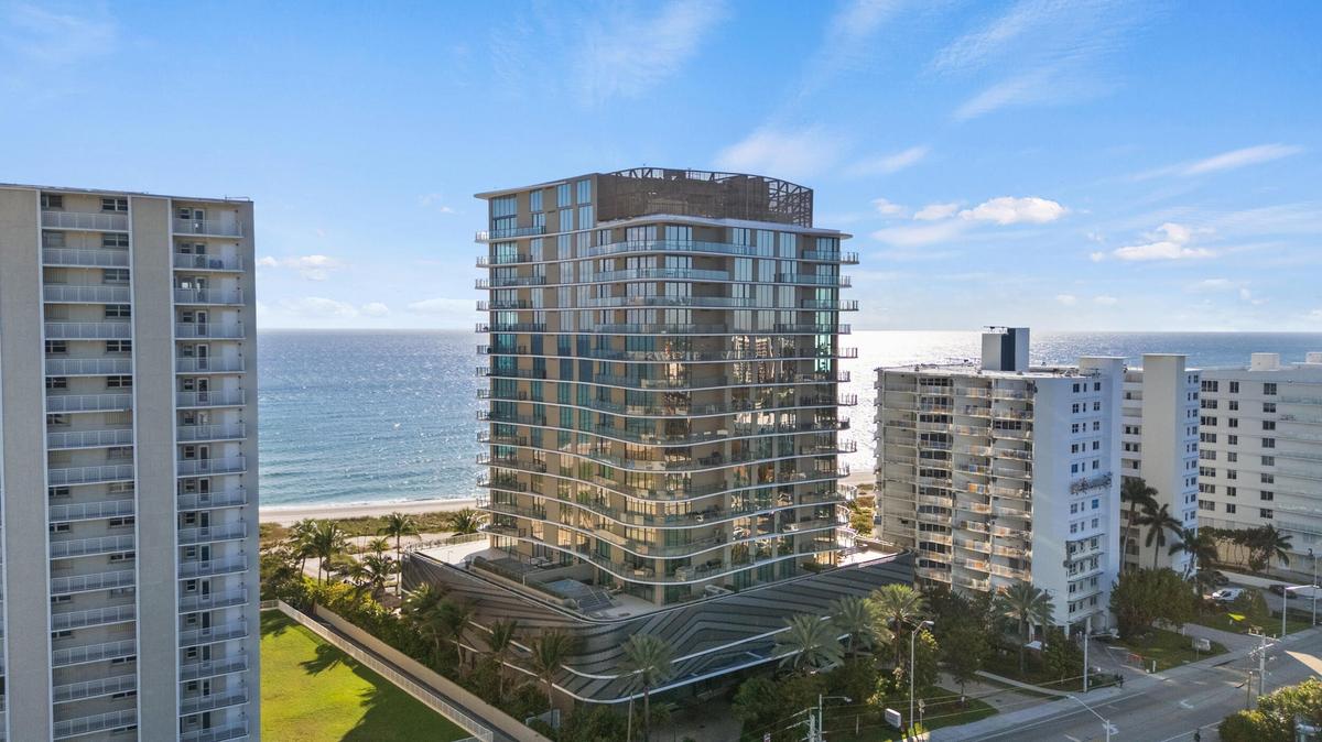 Perched on the 14th floor of Sabbia Beach, this exceptional oceanfront residence offers panoramic views and an elevated boutique lifestyle complete wi