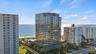 Perched on the 14th floor of Sabbia Beach, this exceptional oceanfront residence offers panoramic views and an elevated boutique lifestyle complete wi
