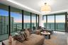 As the sun sets, custom lighting and illuminated accent walls glow in harmony with the soft, colorful evening light that fills the residence.