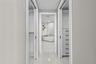 Step from your bedroom past fully customized his-and-hers closets and into a serene ensuite bathroom that feels like your own private spa, complete wi