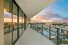 The expansive wraparound balcony offers an exceptional amount of outdoor living space and a peaceful setting to unwind with family and friends. As eve
