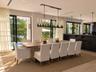 Dining area featuring large-format sliding glass doors, a linear wrought iron chandelier, recessed lighting, wood-finish flooring, and a built-in kitc